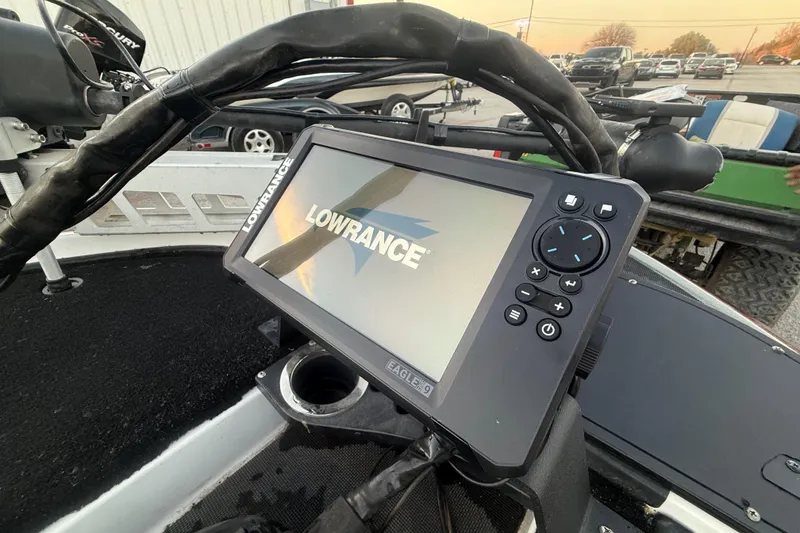 Slide: The Image of 2020 Nitro Z20 boat on trailer by a serene lake at sunset. - 20