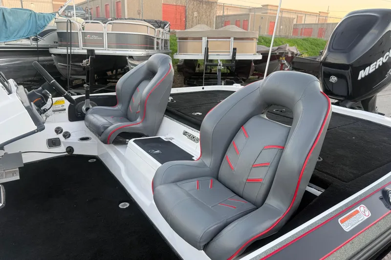 Slide: The Image of 2020 Nitro Z20 boat at sunset by a serene lake with dock. - 25