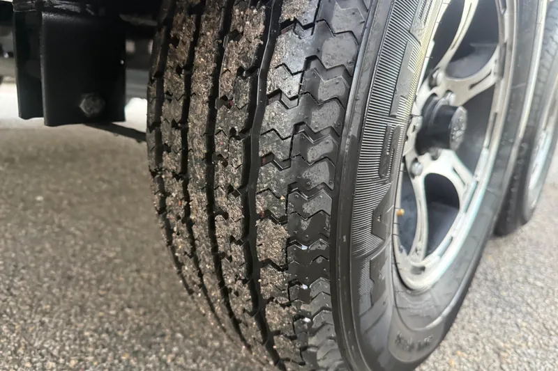 Slide: The Image of 2020 Nitro Z20 boat interior at sunset by a calm lake. - 27