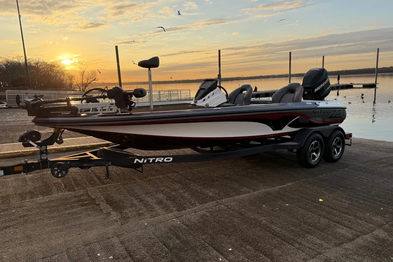 Slide: The Image of Lowrance fishfinder display on Nitro Z20, 2020 model, showing sonar and chart options. - 35
