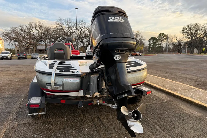 Slide: The Image of 2020 Nitro Z20 boat deck with black carpet and storage compartments. - 44