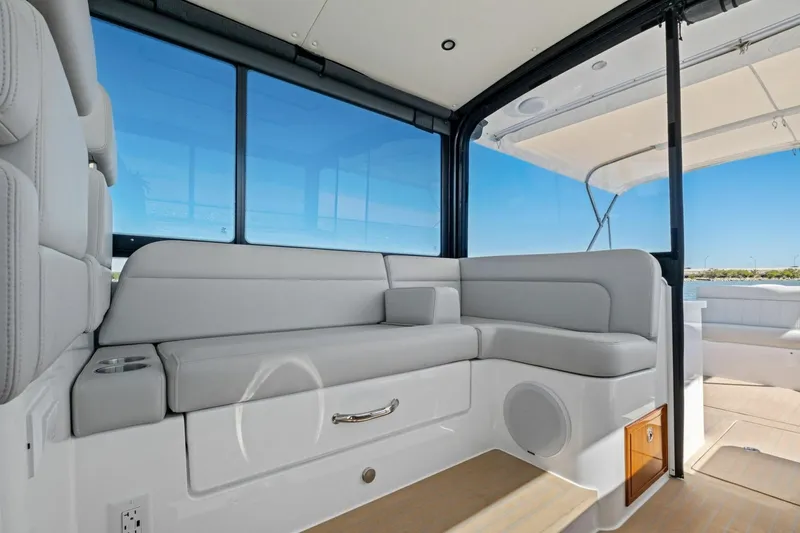 Slide: The Image of Luxurious interior of 2025 MJM 4 boat with comfortable seating and scenic views. - 11