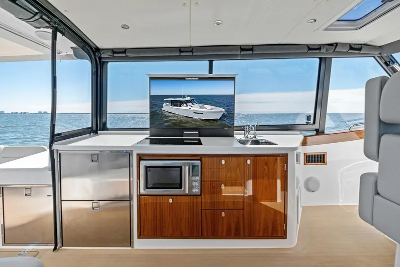 Slide: The Image of Luxurious interior of 2025 MJM 4 yacht with modern amenities and ocean view. - 14