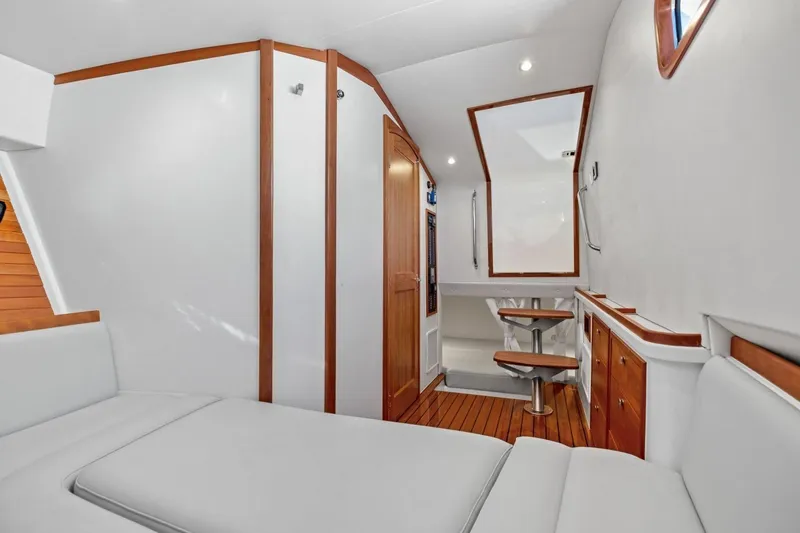 Slide: The Image of Luxurious interior of 2025 MJM 4 yacht with elegant wood accents and modern furnishings. - 18