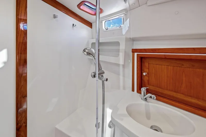 Slide: The Image of Luxurious bathroom in 2025 MJM 4 yacht with wood accents and modern fixtures. - 20