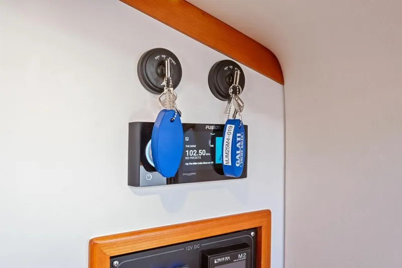 Slide: The Image of Boat dashboard with keys and Fusion stereo, MJM 4 model, 2025. - 21
