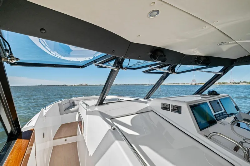 Slide: The Image of Modern MJM 4 yacht interior, 2025 model, with sleek design and advanced navigation system. - 23