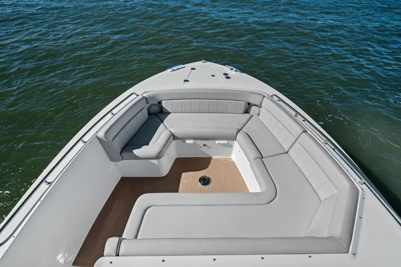 Slide: The Image of Luxurious seating area on 2025 MJM 4 boat, overlooking calm waters. - 35
