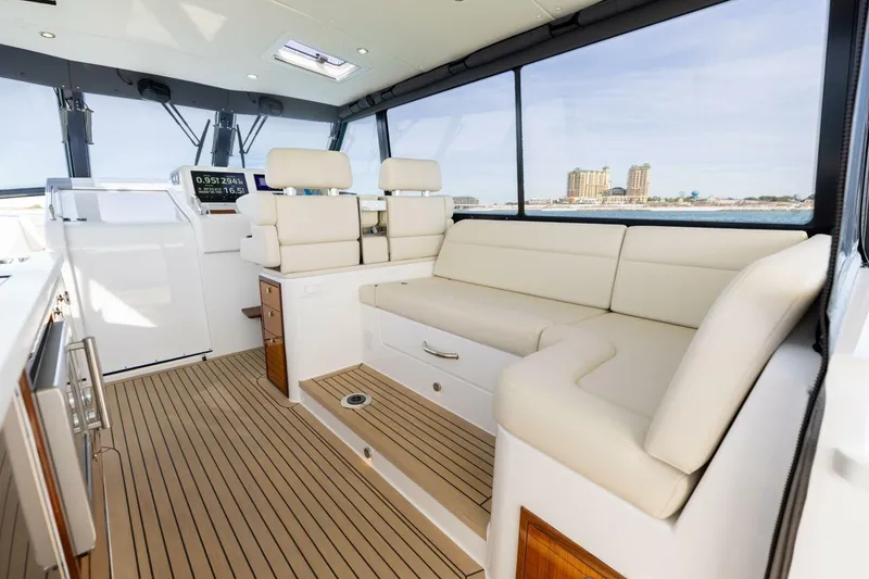 Slide: The Image of Luxurious interior of 2025 MJM 4 boat with plush seating and modern design. - 16
