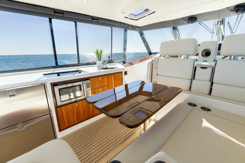 Slide: The Image of Luxurious interior of 2025 MJM 4 yacht with modern kitchen and ocean view. - 18