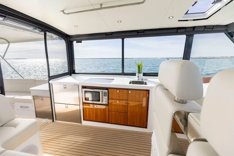 Slide: The Image of Luxurious interior of 2025 MJM 4 yacht with modern kitchen and ocean view. - 19