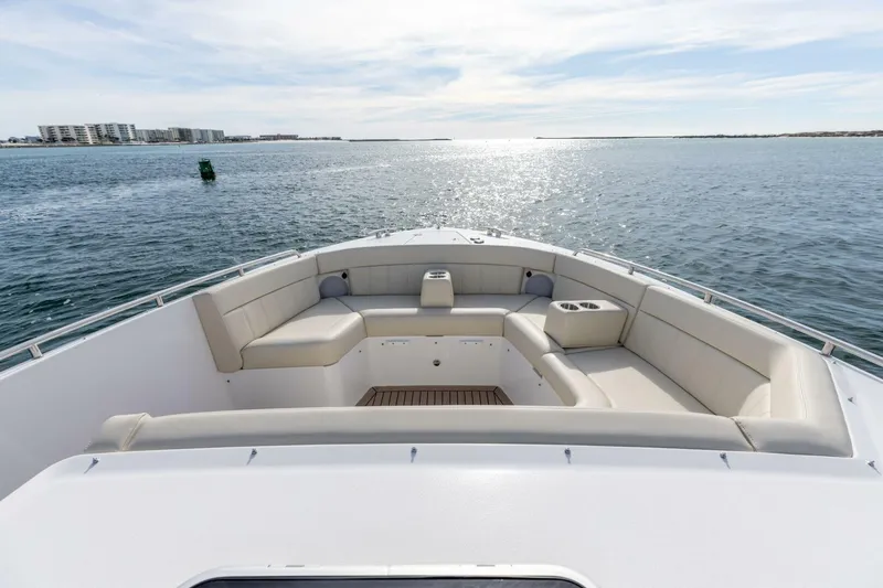Slide: The Image of Luxurious seating on 2025 MJM 4 boat, overlooking serene ocean waters. - 36