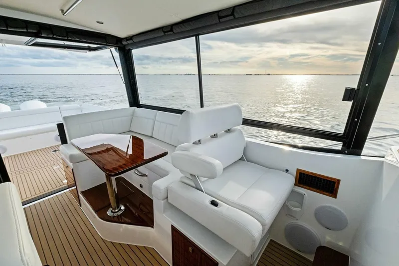 Slide: The Image of Luxurious interior of 2025 MJM 42 yacht with ocean view and elegant seating. - 10