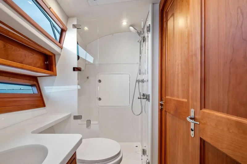 Slide: The Image of Luxurious bathroom in 2025 MJM 42 yacht with wooden accents and modern fixtures. - 19