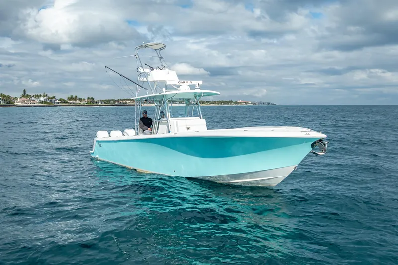 The Image of 2017 SeaVee 370Z boat on open water under cloudy sky. - 1