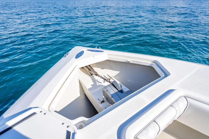 Slide: The Image of 2017 SeaVee 370Z boat anchor compartment with ocean backdrop. - 26