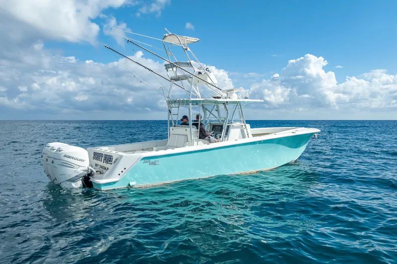 Slide: The Image of 2017 SeaVee 370Z boat on open ocean under blue sky. - 3