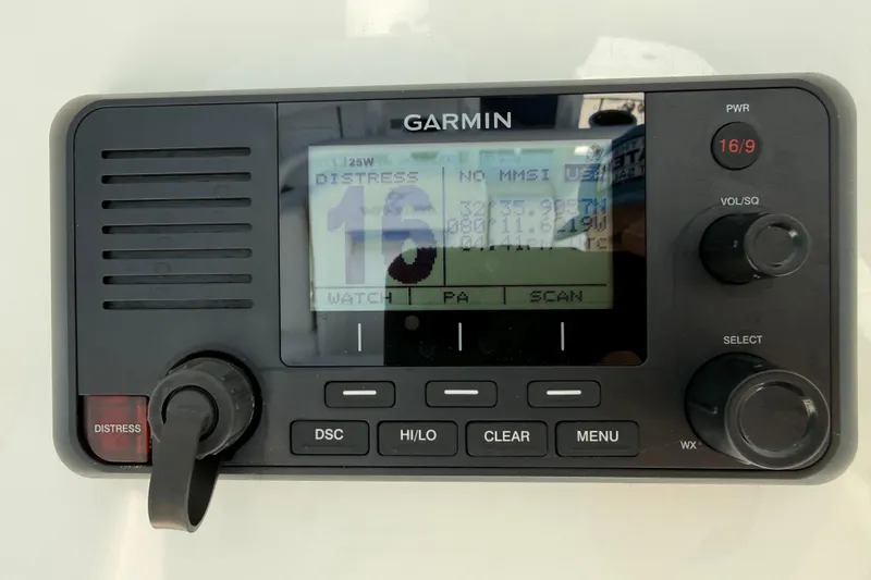 Slide: The Image of Garmin marine radio on a 2020 Regulator 31 boat, displaying distress channel. - 13