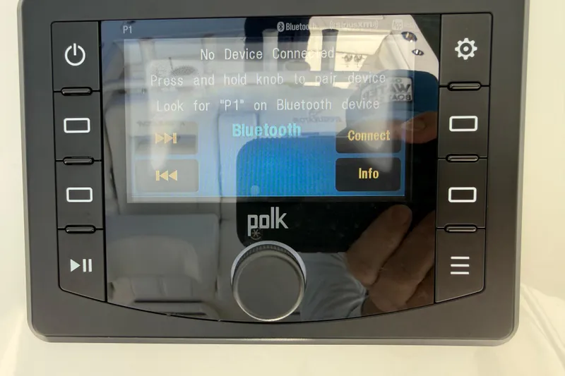 Slide: The Image of Polk audio system display on 2020 Regulator 31 boat, showing Bluetooth connection options. - 14