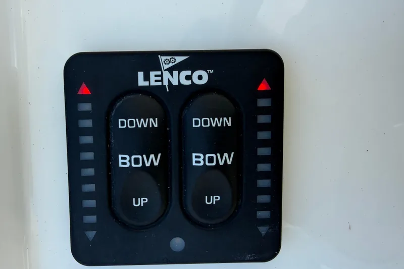 Slide: The Image of Lenco trim tab control panel on 2020 Regulator 31 boat. - 17