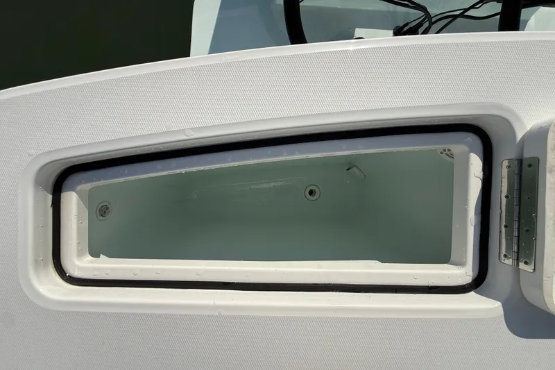 Slide: The Image of Livewell compartment on a 2020 Regulator 31 boat, open and empty. - 35