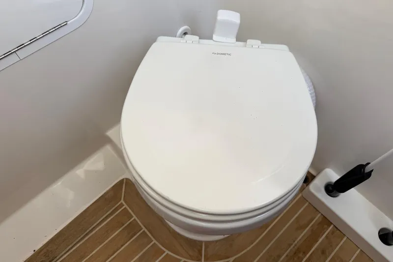 Slide: The Image of Marine toilet on Regulator 31 boat, year 2020. - 40