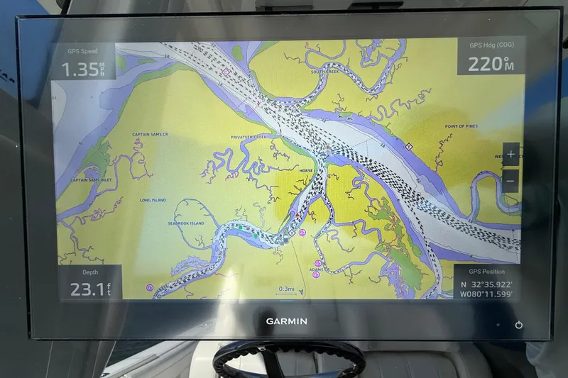 Slide: The Image of Garmin GPS map display on 2020 Regulator 31 boat, showing navigation details and depth. - 9