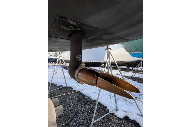 Slide: The Image of Propeller of 2007 Beneteau First 10R sailboat on stands, winter storage. - 15