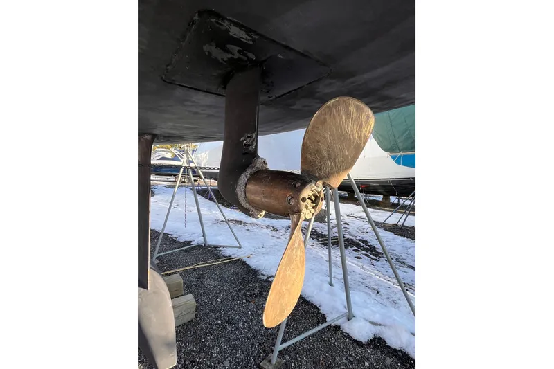 Slide: The Image of Propeller of 2007 Beneteau First 10R sailboat on dry dock with snow. - 16