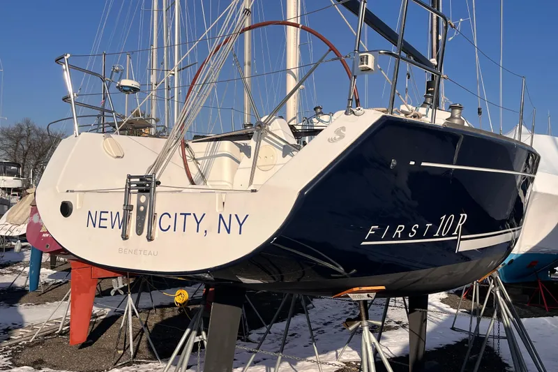 Slide: The Image of 2007 Beneteau First 10R sailboat in New City, NY, on stands in a marina. - 2