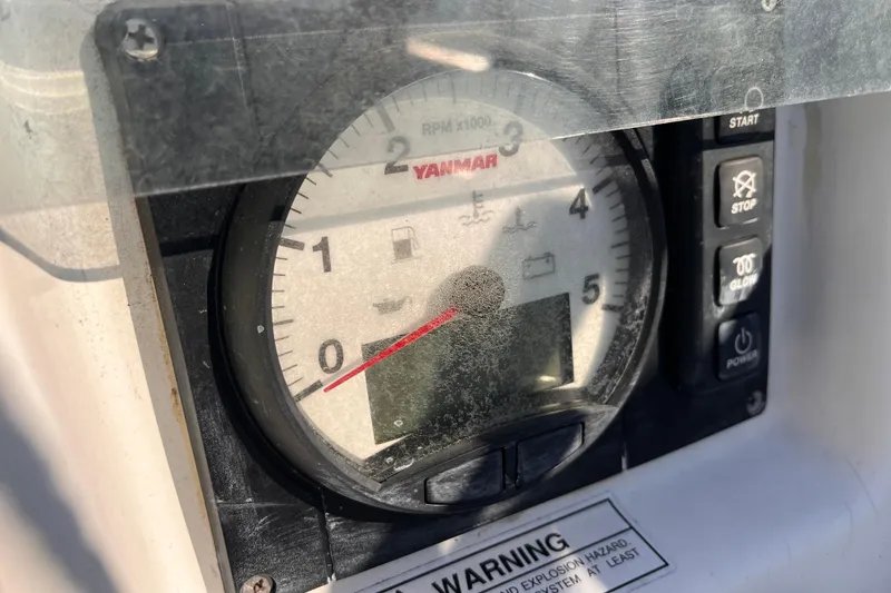 Slide: The Image of Yanmar engine control panel on a 2007 Beneteau First 10R sailboat. - 25