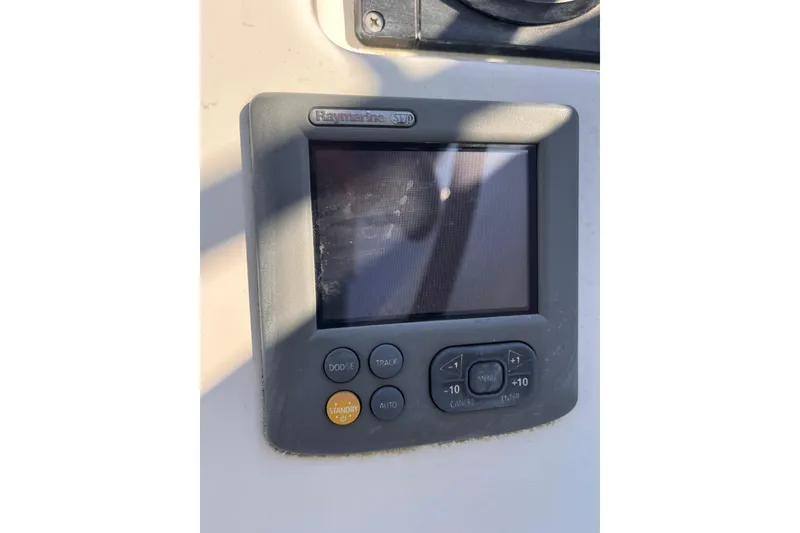 Slide: The Image of Raymarine ST6002 autopilot control on 2007 Beneteau First 10R sailboat. - 26