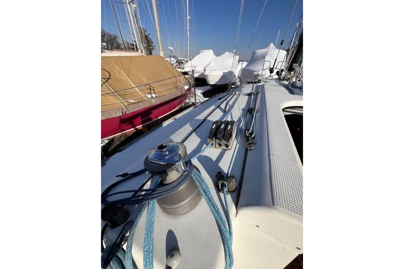 Slide: The Image of 2007 Beneteau First 10R sailboat deck with winch and rigging details. - 30