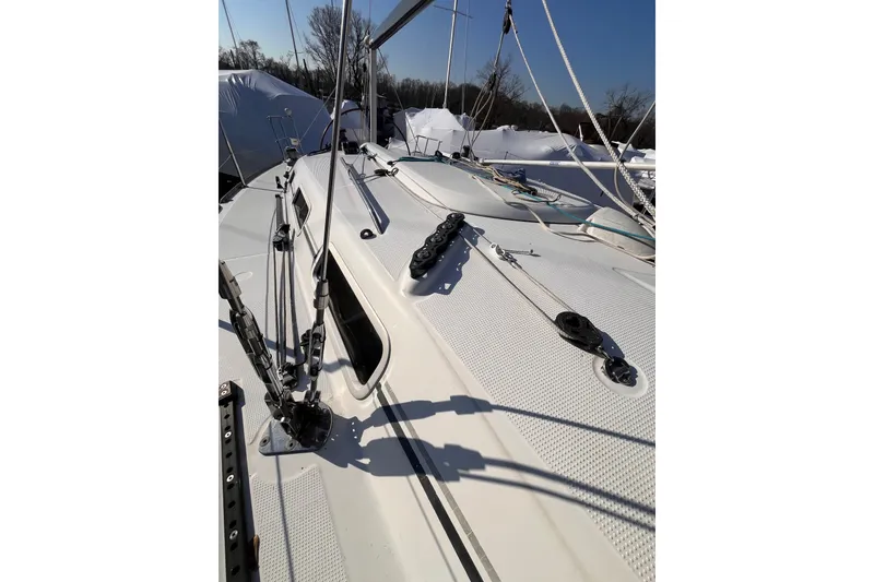 Slide: The Image of 2007 Beneteau First 10R sailboat deck with rigging and winches. - 41