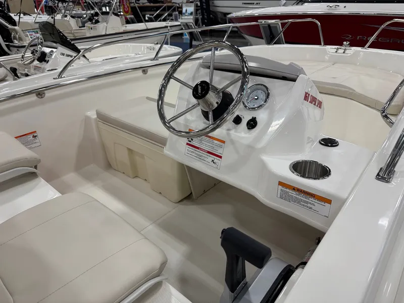 Slide: The Image of Interior of 2026 Boston Whaler 160 Super Sport with steering console. - 10