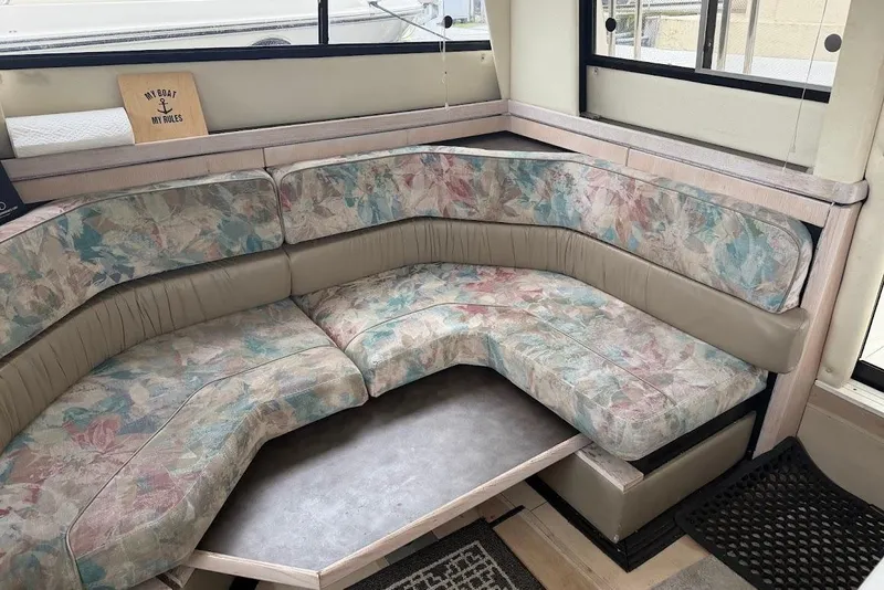 Slide: The Image of Interior of 2001 Bayliner 3258 Command Bridge with floral-patterned seating. - 8
