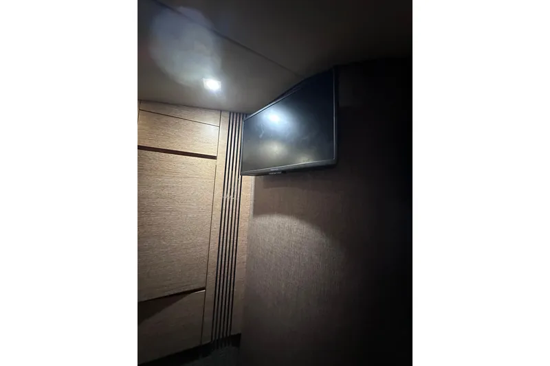 Slide: The Image of Interior of 2011 Azimut 38 yacht with wall-mounted TV and modern lighting. - 18