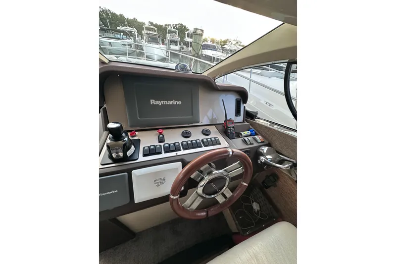 Slide: The Image of Helm of 2011 Azimut 38 yacht with Raymarine navigation system. - 21