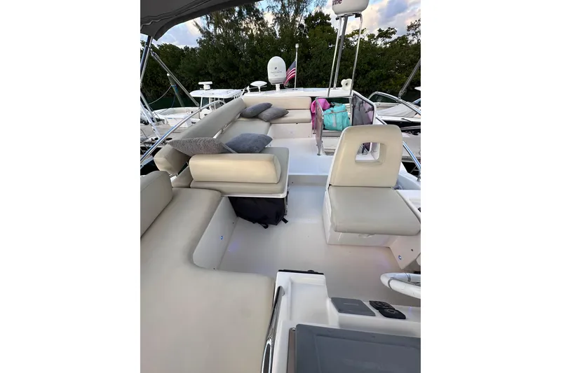 Slide: The Image of Luxurious 2011 Azimut 38 yacht interior with comfortable seating and cushions. - 31