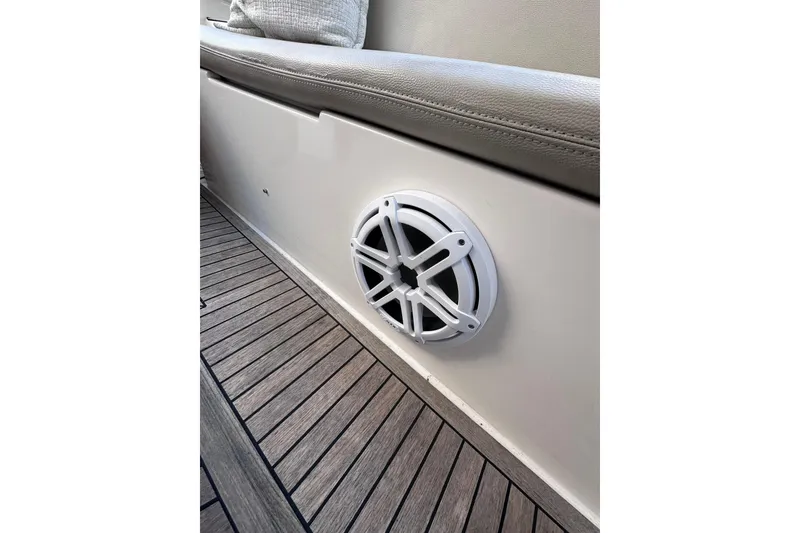 Slide: The Image of Speaker on Azimut 38 yacht, 2011 model, with wooden deck and cushioned seating. - 33