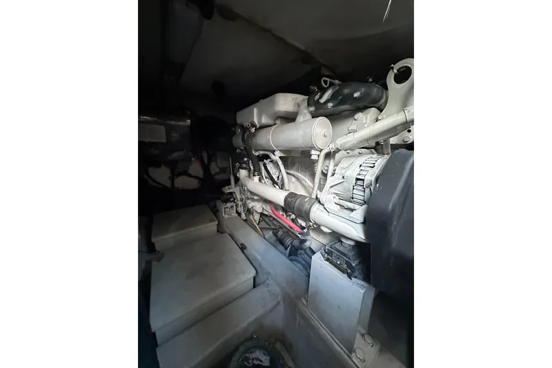 Slide: The Image of Engine compartment of a 2011 Azimut 38 yacht, showcasing mechanical components. - 35