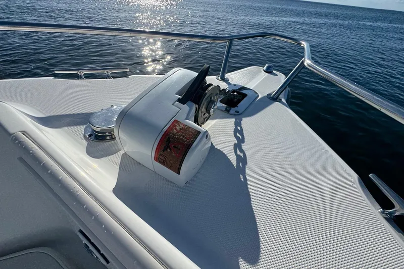 Slide: The Image of 2003 Century 2600 Center Console boat deck with anchor and ocean view. - 5