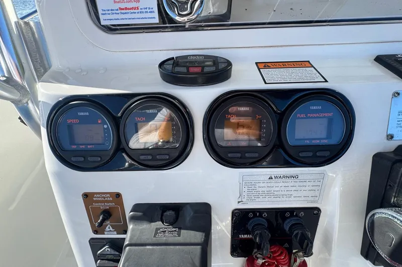 Slide: The Image of Dashboard of a 2003 Century 2600 Center Console boat with Yamaha gauges. - 8