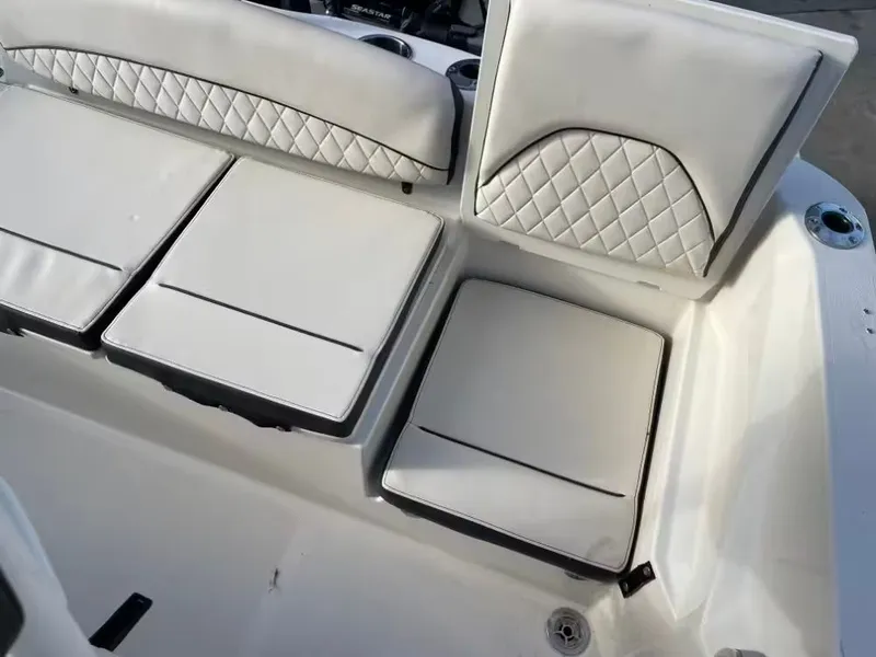 Slide: The Image of Interior of 2023 Stingray 206 CC with white cushioned seats. - 5