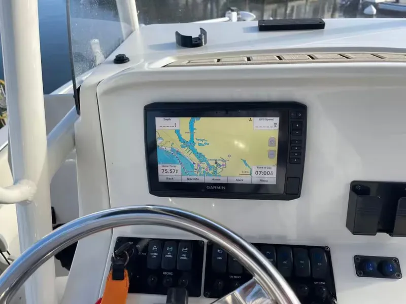 Slide: The Image of Garmin navigation system on a 2023 Stingray 206 CC boat. - 8