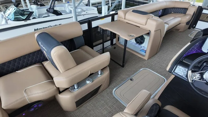 Slide: The Image of Interior of 2026 Barletta Lusso 25UA with luxurious seating. - 27