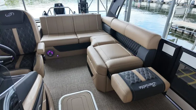 Slide: The Image of Interior of 2026 Barletta Lusso 25UA with luxurious seating. - 30