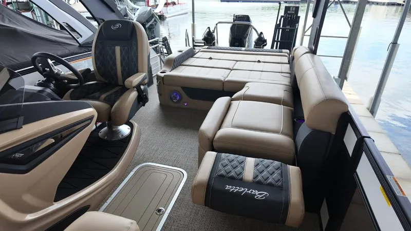 Slide: The Image of Interior of 2026 Barletta Lusso 25UA with luxurious seating. - 31