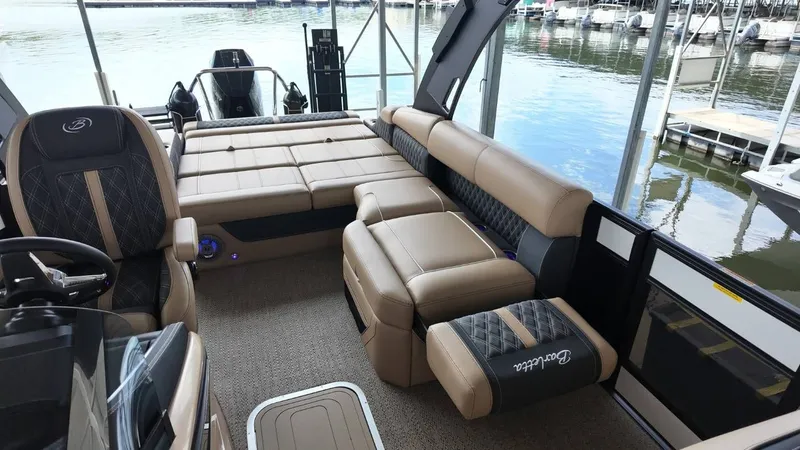 Slide: The Image of Luxurious interior of the 2026 Barletta Lusso 25UA pontoon boat. - 32