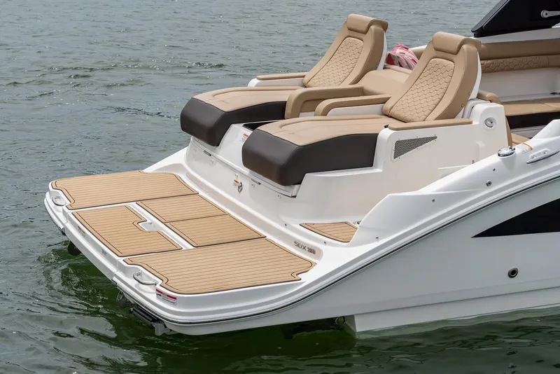 Slide: The Image of Manufacturer Provided Image: 2023 Sea Ray SDX 290 boat with luxurious rear seating and swim platform. - 11